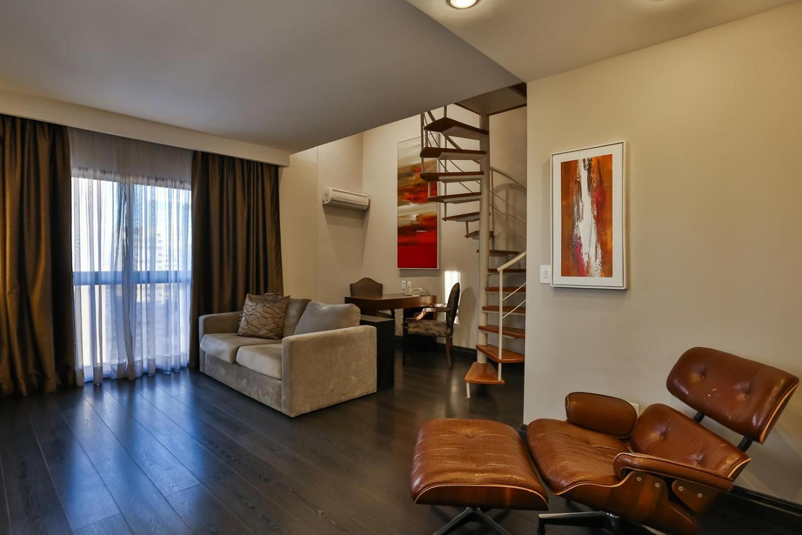 Double Tree By Hilton Sao Paulo Itaim Hotel Kültér fotó A living room with a spiral staircase